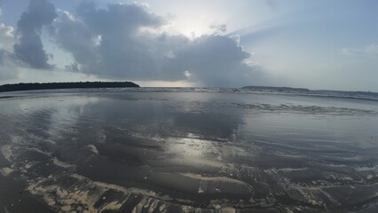 Serene Seascape with Dramatic Cloud Formation over Water