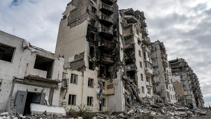 ruined street and destroyed houses the city Kiev war in Ukraine