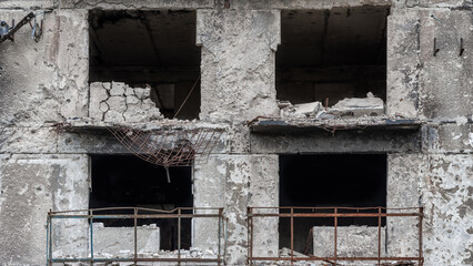 ruined street and destroyed houses the city Kiev war in Ukraine