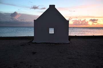 Bonaire, Kralendijk - aerial view over Old Slave Huts (white) at sunset in beautiful light