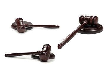 Wooden judge gavel and soundboard isolated on a white background.