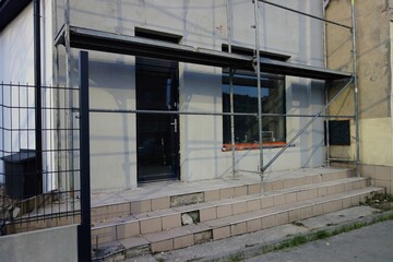 Repaired local building for premises under business.