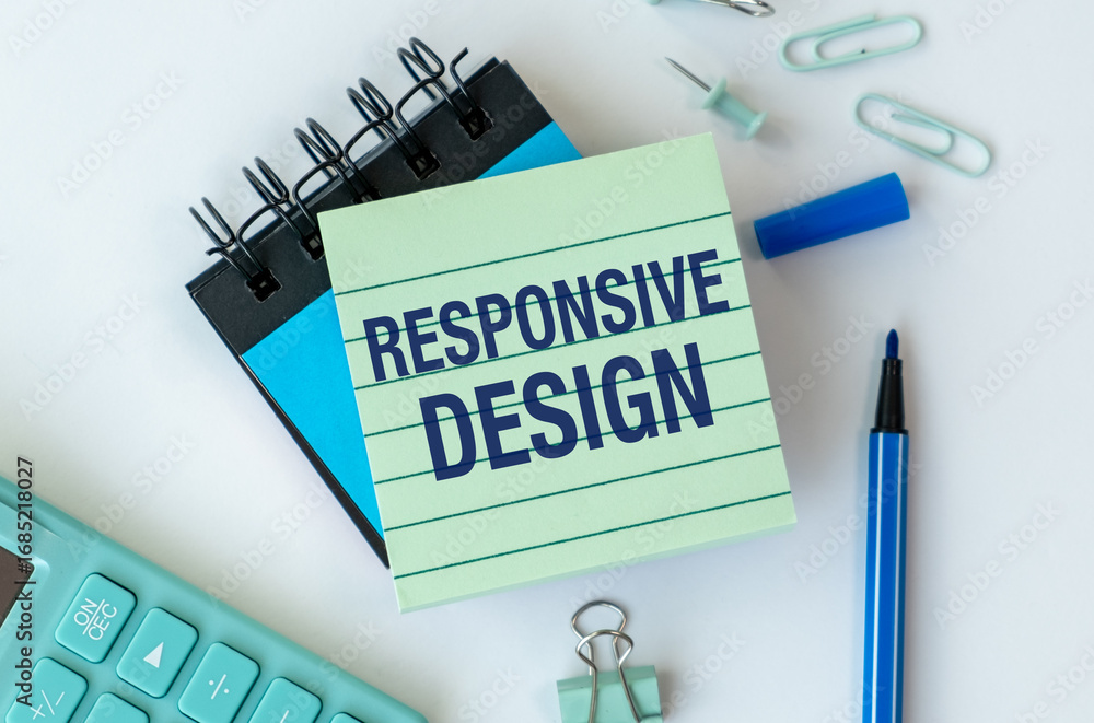 Poster a green notebook with the word responsive design written on it