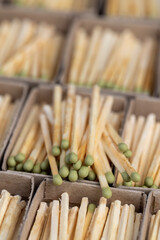 wooden matchboxes with matches with sulfur for ignition, open matchboxes with new matches made of natural wood