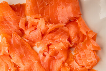 Smoked salmon fish seafood portion size natural product tasty snack fresh delicious gourmet food background on the table rustic top view copy space pescetarian diet