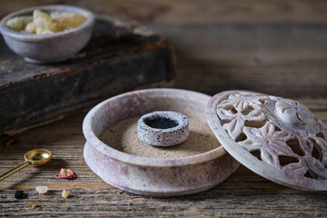 Traditional Incense Burner with Charcoal on Wooden Table, Moody Style