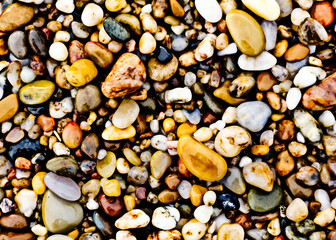 Close-up of a collection of colorful, smooth pebbles