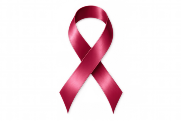 Pink metallic ribbon representing breast cancer awareness, research, and hope against transparent backdrop