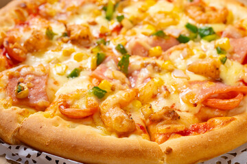 angle view fresh pizza with shrimps and bacon toppings