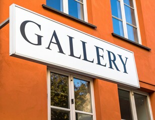 Gallery sign on building exterior showcasing art and architecture.