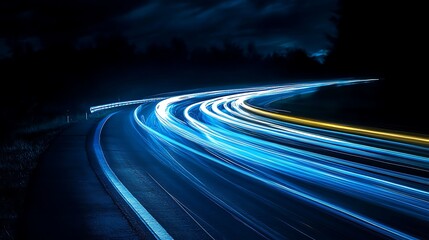 Long Exposure of Car Light Trails on Dark Highway Curve at Night Time