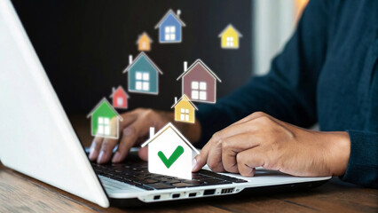 Finding your perfect home online, a person searches for properties on a laptop with colorful house icons floating around.