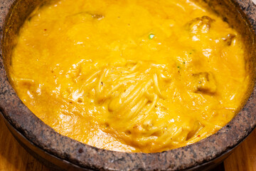 angle view beef curry with enoki mushrooms at horizontal composition