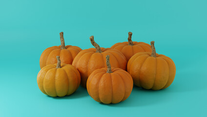 Pumpkins group isolated on light blue background.