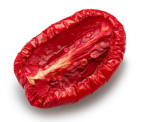 Sundried roma tomato or plum tomato half on white background. File contains clipping path.
