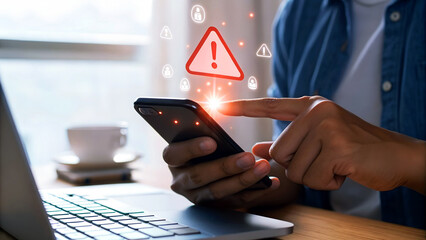 Alerts flash on smartphone screen as person touches display amidst digital icons, signaling cybersecurity concerns.