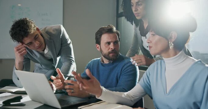 Business, laptop and frustrated team in meeting with headline error, article criticism or solution. Journalist, people or stress with editor at publishing agency for submission fail, mistake or flare