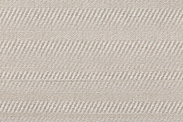 Wallpaper with a fabric texture featuring diagonal lines in white tones