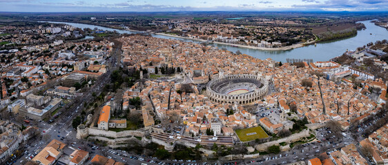 Aerial panoramic view around the old town and city Arles in France on a sunny afternoon
