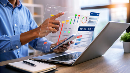 Dynamic professional analyzing futuristic data charts and to-do list on interactive digital display, boosting productivity