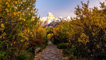 Autumnal mountain path through a vibrant forest archway