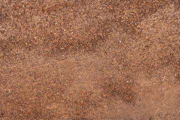 Dirt, terrain or gravel stone road surface pattern in outdoor environmental. Background and textured photo.	