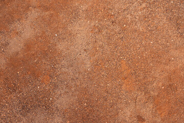 Dirt, terrain or gravel stone road surface pattern in outdoor environmental. Background and textured photo.	