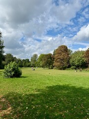 Amsterdam Vondelpark on a sunny autumn day with Dutch clouds