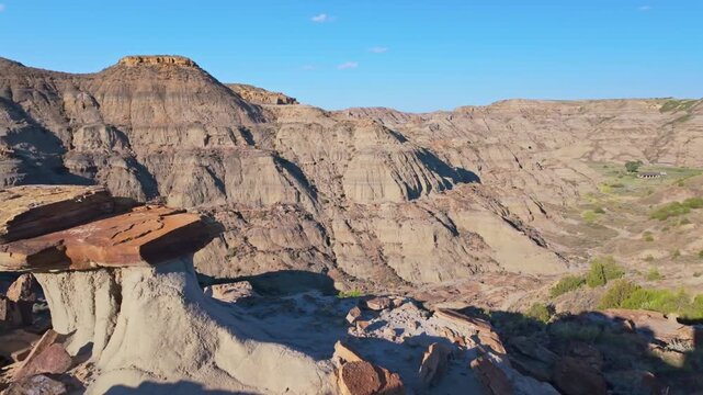 A dramatic sunset over the badlands formations of Makoshika State Park as seen from the Cap Rock Trail