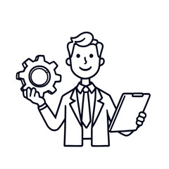 Fototapeta premium Smiling male manager with a suit and tie holding a gear for success