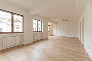 Main living room with bioclimatic design, north-south orientation for maximum light, and integrated...