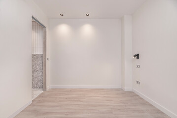 Distressed wooden flooring in a bare room, evoking a rustic style full of character