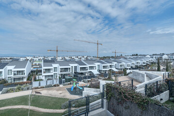 Housing design that explores textures and materials, using the central courtyard as a showcase where the pool is just another detail