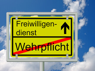 Ortsschild mit der Aufschrift Wehrpflicht und Freiwilligendienst