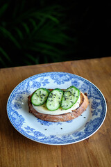 toast with cucumber, cheese and black sesame