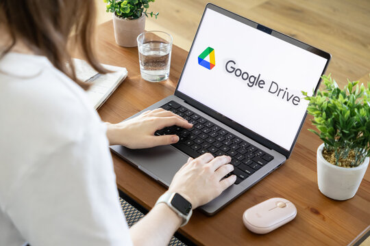 Poznan, Poland - August 23, 2025: Google Drive application on a laptop screen, used by a person for cloud storage, online collaboration, and remote work