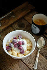 lazy dumplings with cream sauce and berries