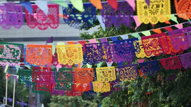 Colorful Papel Picado Banners Decorating a Latin American Fiesta