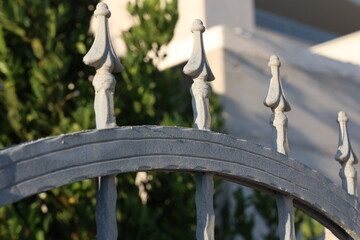 Metal curly fence in the park