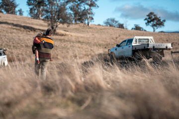 agronomist on a farm practicing agronomy holding soil, doing soil tests in her home laboratory. Looking at soil life