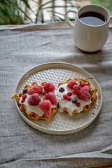pumpkin waffles with cream and berries