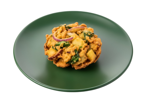 A golden-brown, crispy, vegetable fritter sits on a deep green plate, showcasing a delectable dish.