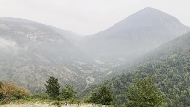 Leitariegos Pass, in Asturias, covered in fog with the mountains in the sun