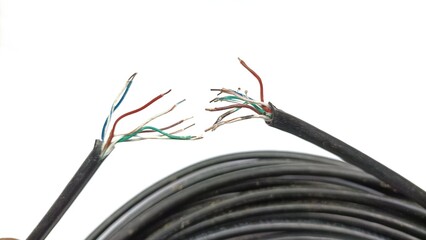 Damage to the cable network with torn wire on white background