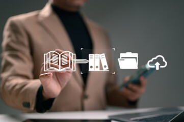 Professional manages digital documents, archives business records, stores files cloud servers. Hand...