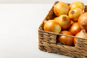 Onion on the kitchen table. onion slice. onion rings. Fresh Yellow Onion. Natural, fresh, vegetarian food. Agricultural products. Healthy eating. Vegetables. Farmer's market. Space for text.Copy space