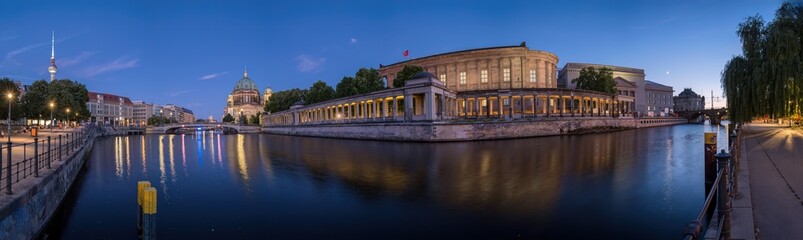 Naklejka premium Panorama of the Museum Island in Berlin with the TV Tower and the cathedral at twilight