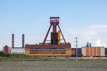 Fototapeta premium Potash salt mining plant against blue sky