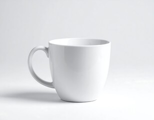Fototapeta premium Clean white ceramic mug with handle on a bright studio background, ready for customization