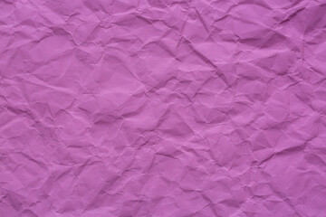 Close-up macro of crumpled pink paper texture,Abstract light pink paper texture background. Texture of crumpled craft paper. Paper background. Recycled pink paper backdrop in close up. Pink Textures. 